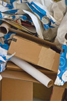 Photo of Christmas paper & boxes ready to be recycled. © iStockphoto.com | Judith Bicking